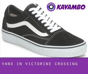 Vans in Victorine Crossing